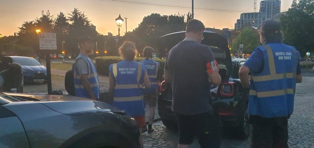 Bristol Central Church Soup Kitchen handing out soup from a car