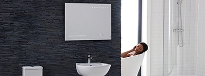 LED bathroom mirror mounted on wall