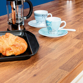 Wooden kitchen worktop with cups