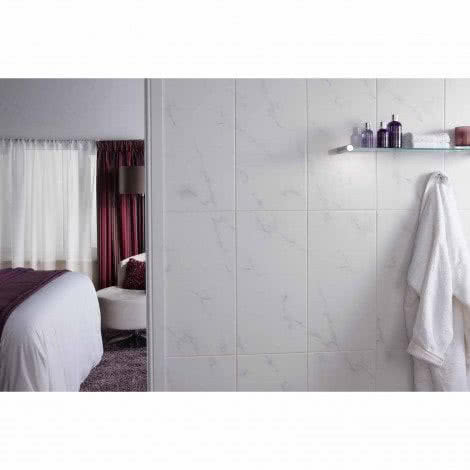 White marble effect tiled bathroom wall
