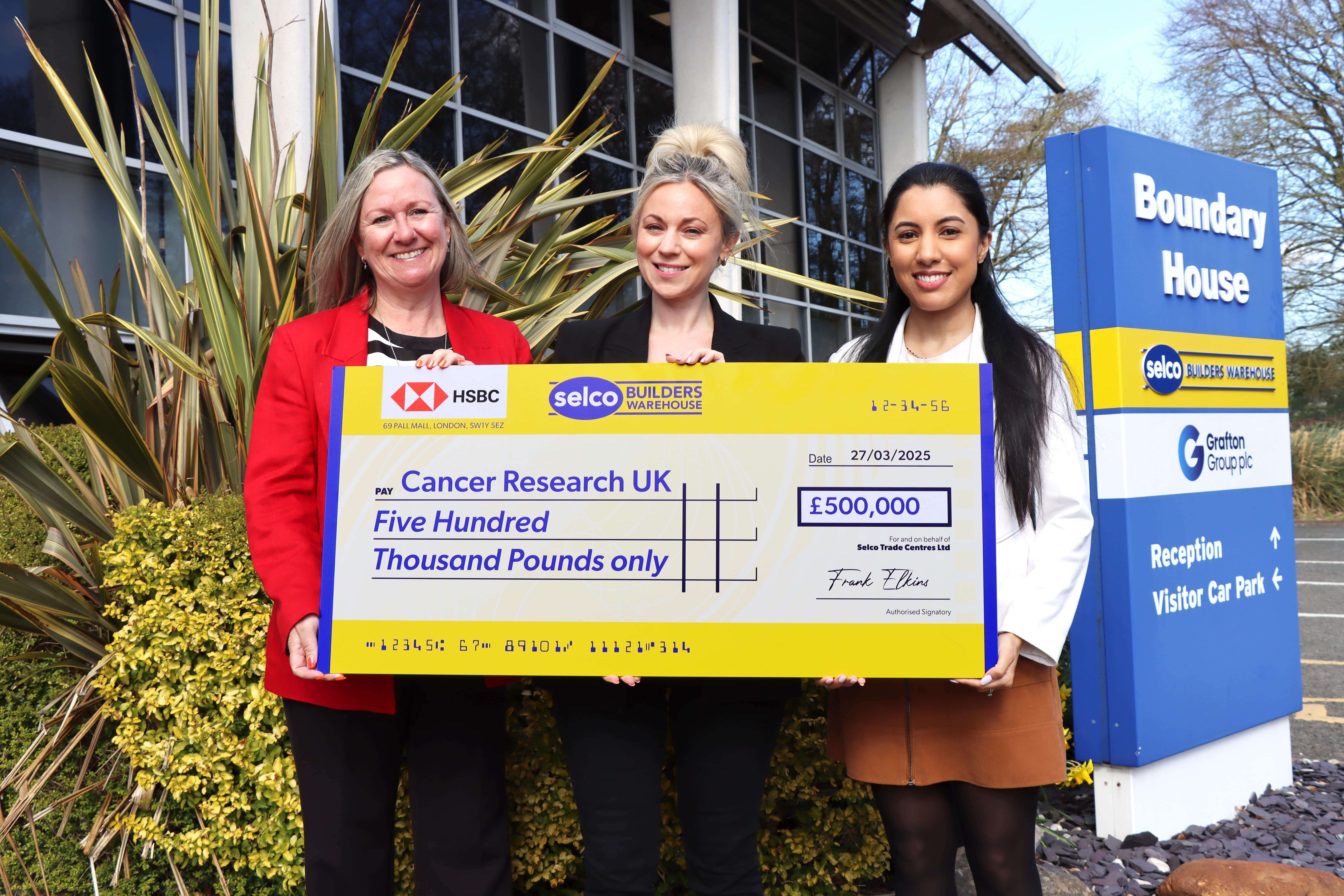 Selco presents 500k check to CRUK