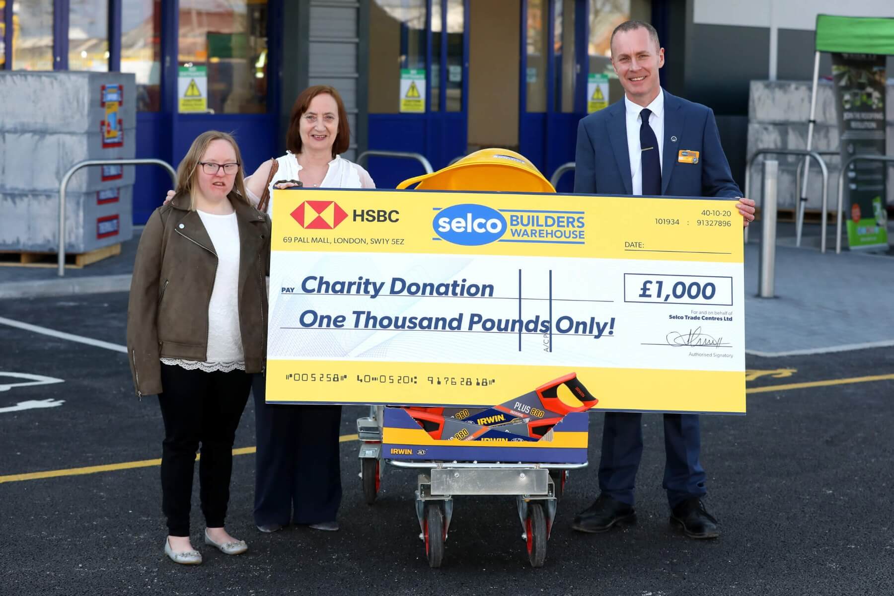 Selco celebrates opening Liverpool branch by donating £1000 to Down Syndrome Liverpool