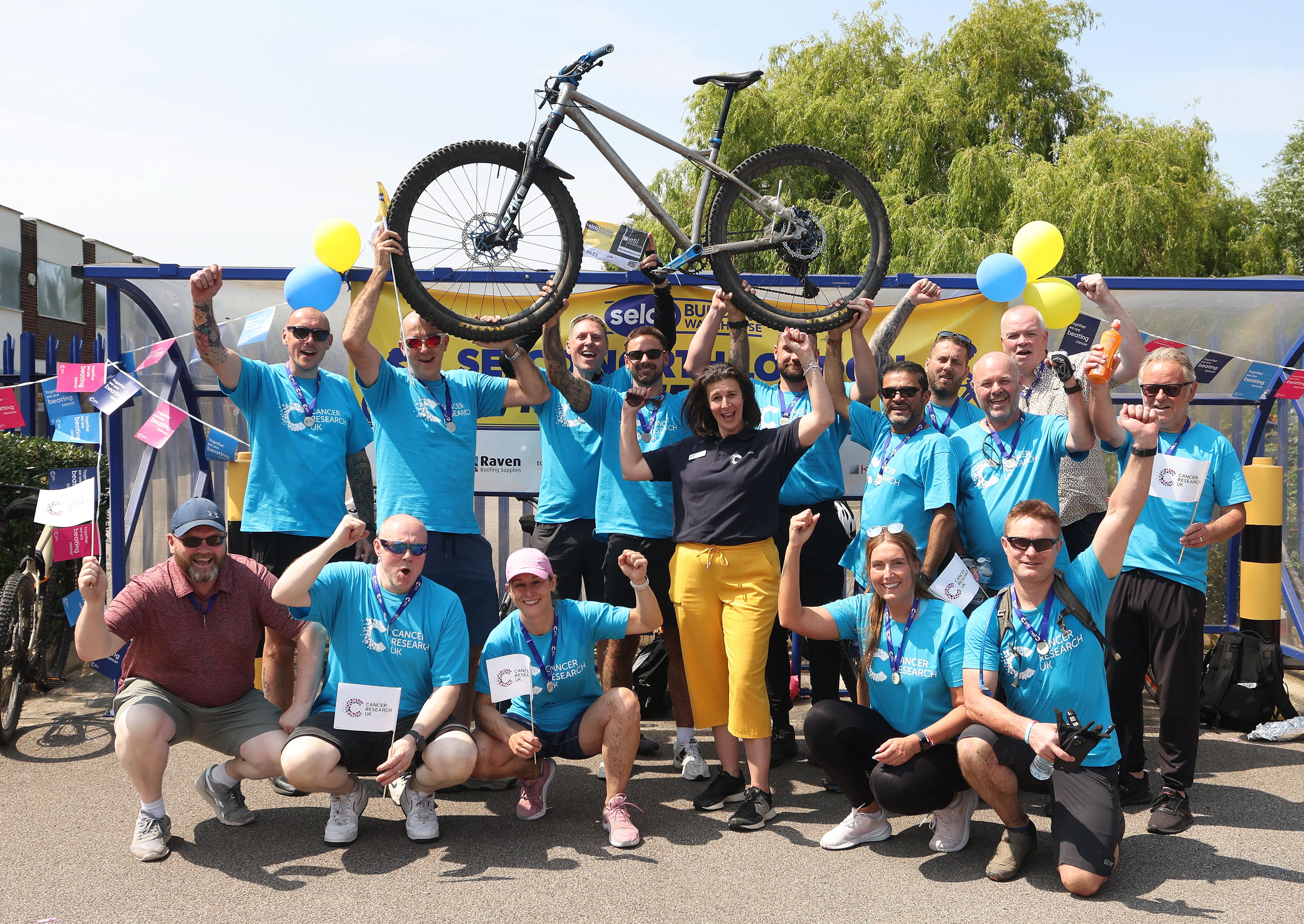 Selco Colleagues celebrating charity bike ride