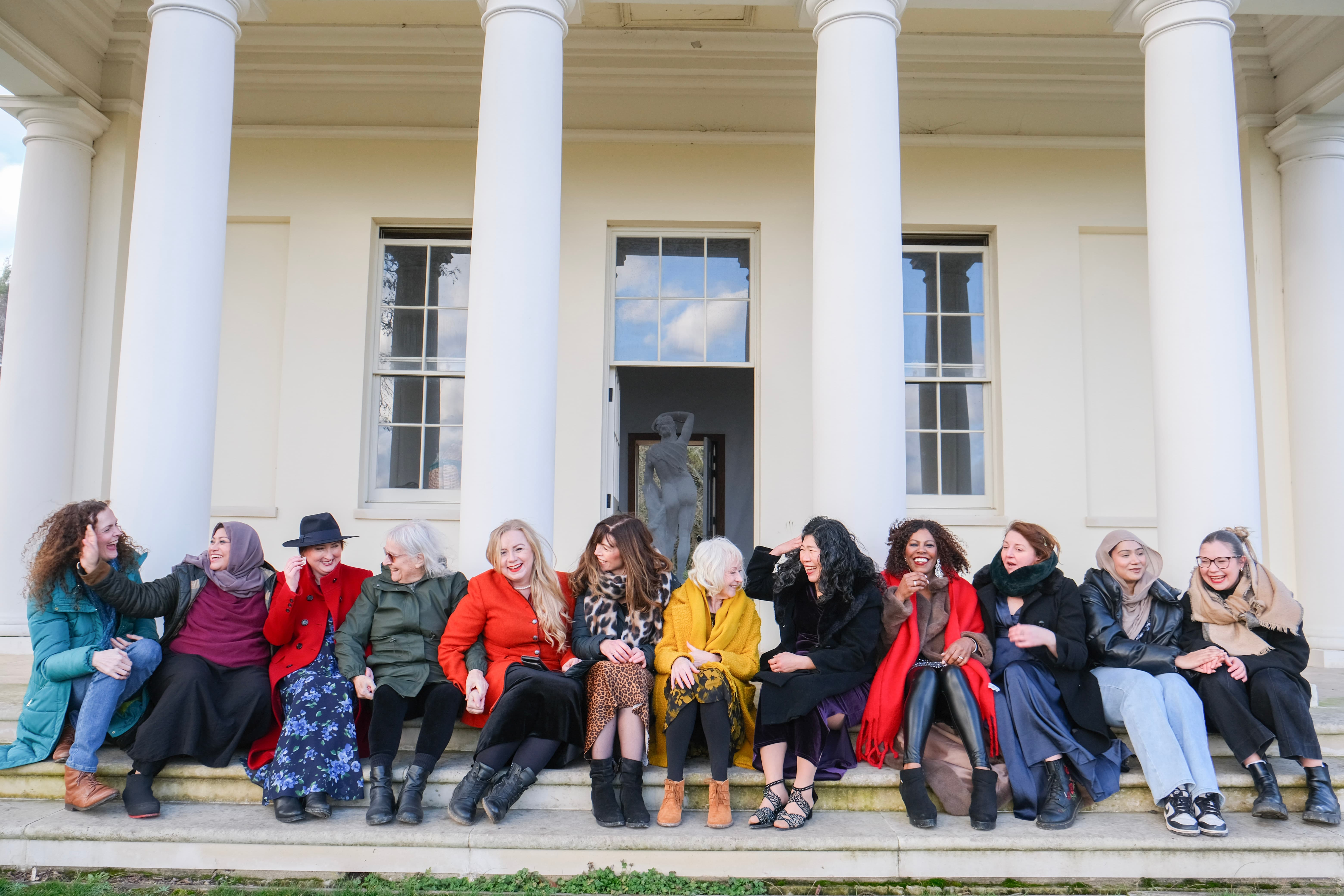 Voices of hope group of women sat in a line